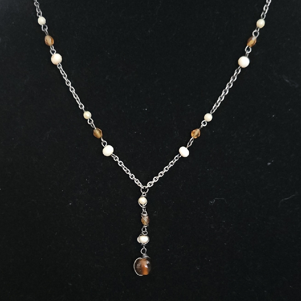 Elegant Silver and Cream Necklace
